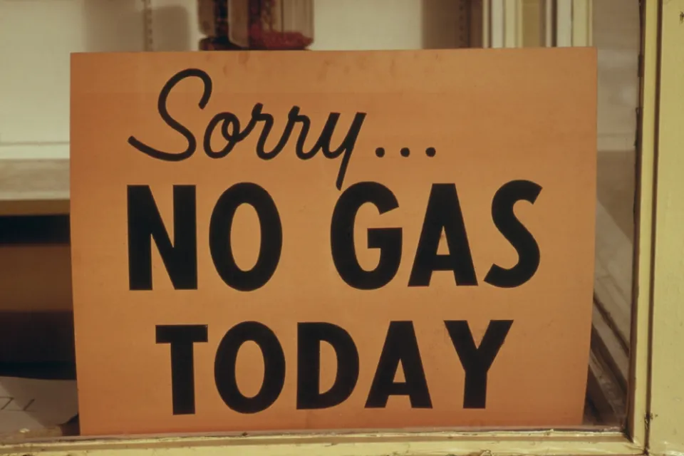 A sign reads “Sorry No Gas Today”.